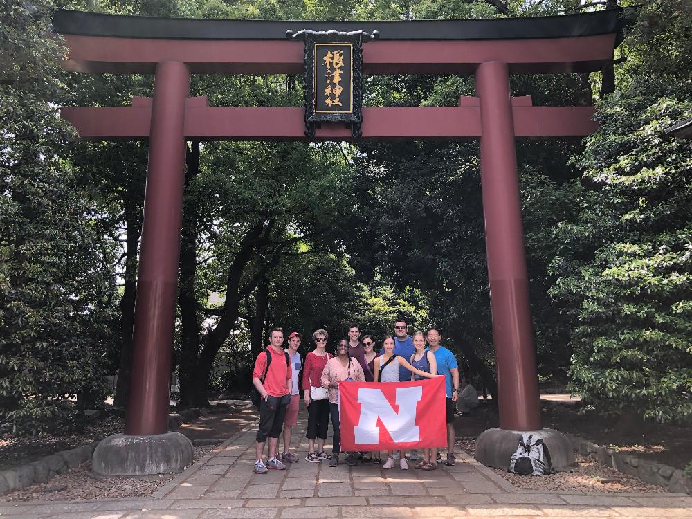 Group under shrine in Japan.